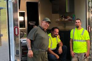 Bruce Kosensky With Customers 1