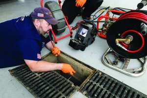 New Hampshire Drain Cleaner Takes On Challenging Service Area With a Smile