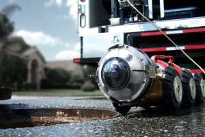 Duc on street at manhole on pipe ranger 190530 123026